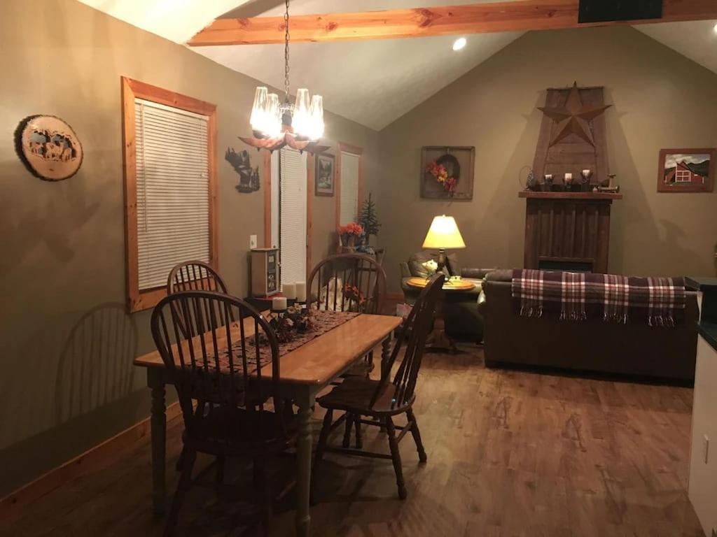 Gas Fireplace, Firepit, And Cedar Adirondack Chair Spencer Exterior foto