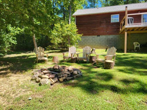 Gas Fireplace, Firepit, And Cedar Adirondack Chair Spencer Exterior foto